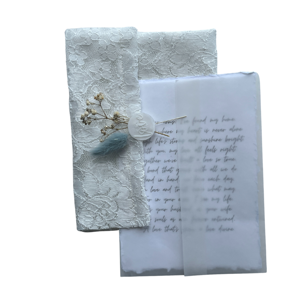 White fabric envelope with letter, 5 x 7 in.