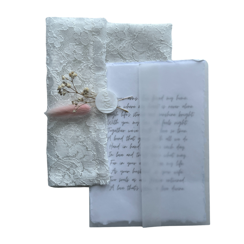 White fabric envelope with letter, 5 x 7 in.