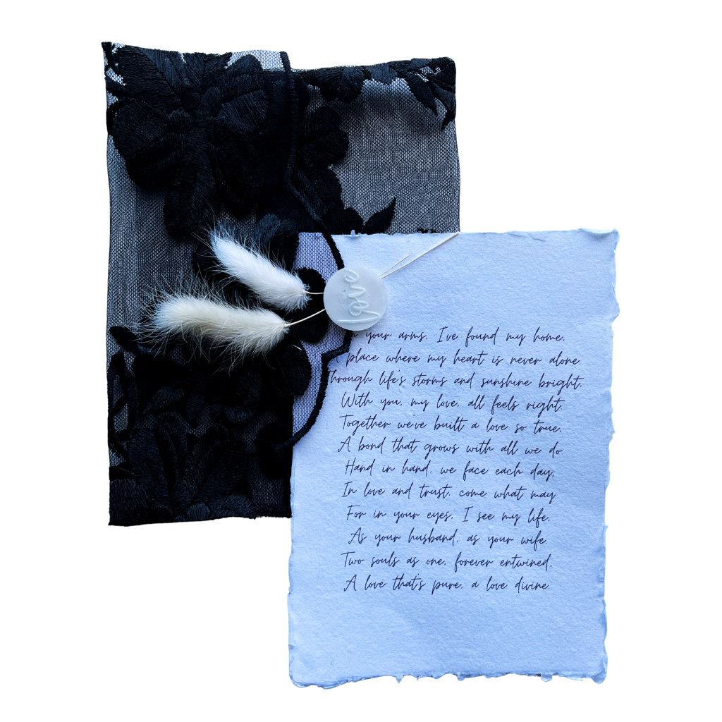 Black fabric envelope with letter, 5 x 7 in.